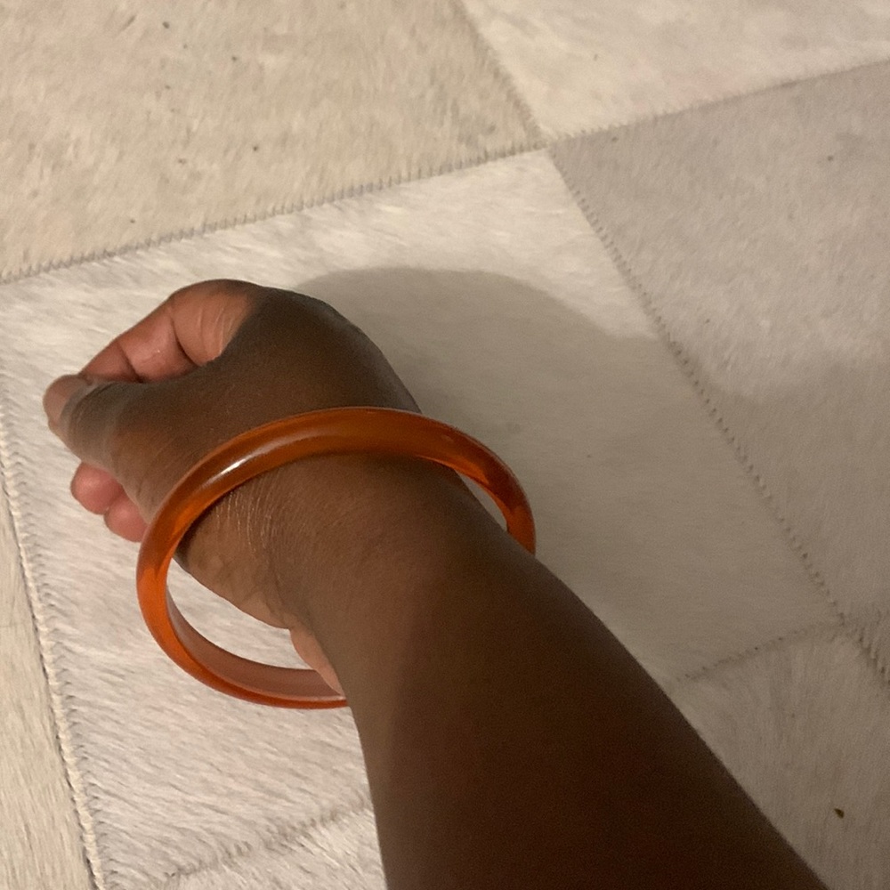 Orange plastic/resin bracelet